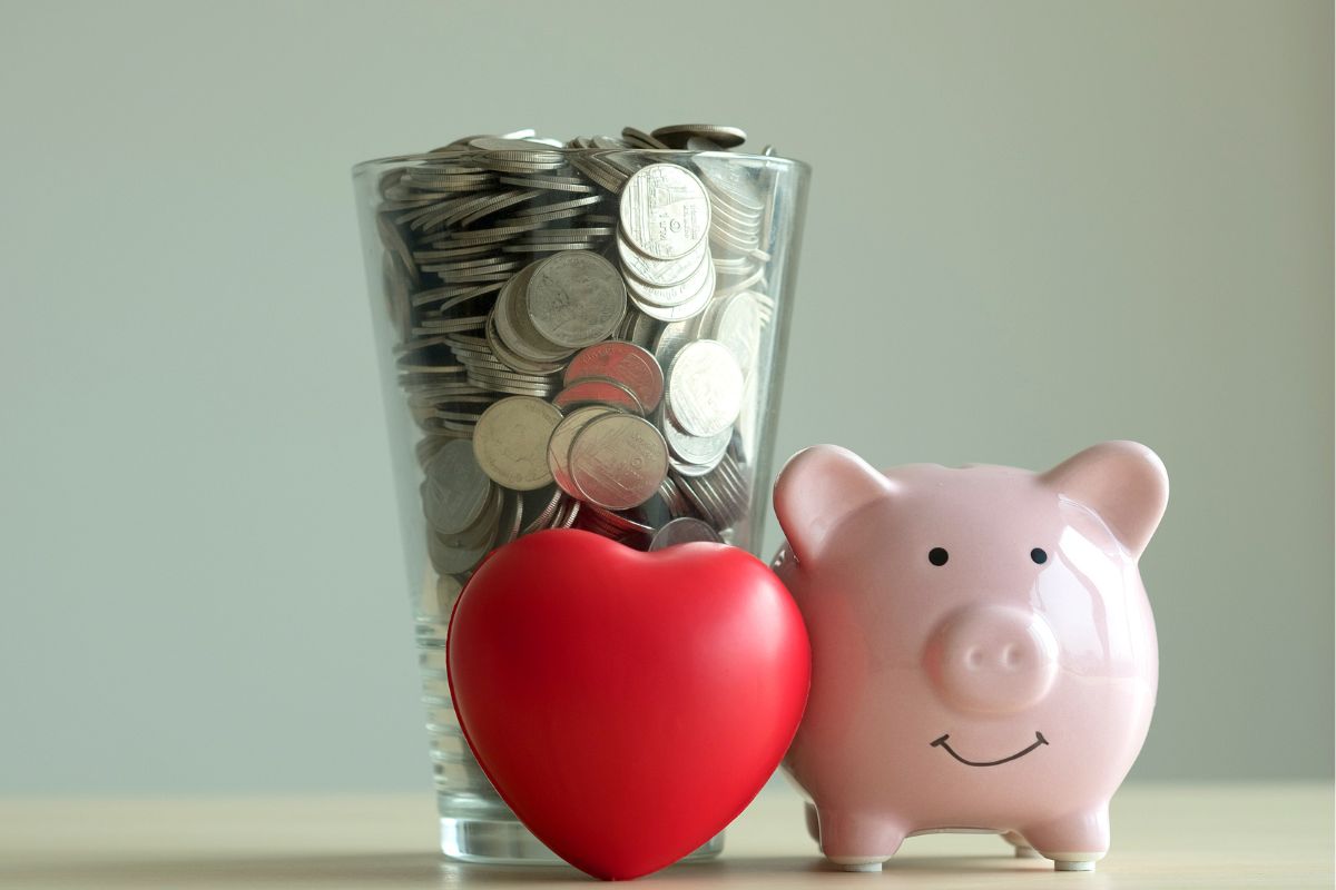 A picture of a glass full of coins.