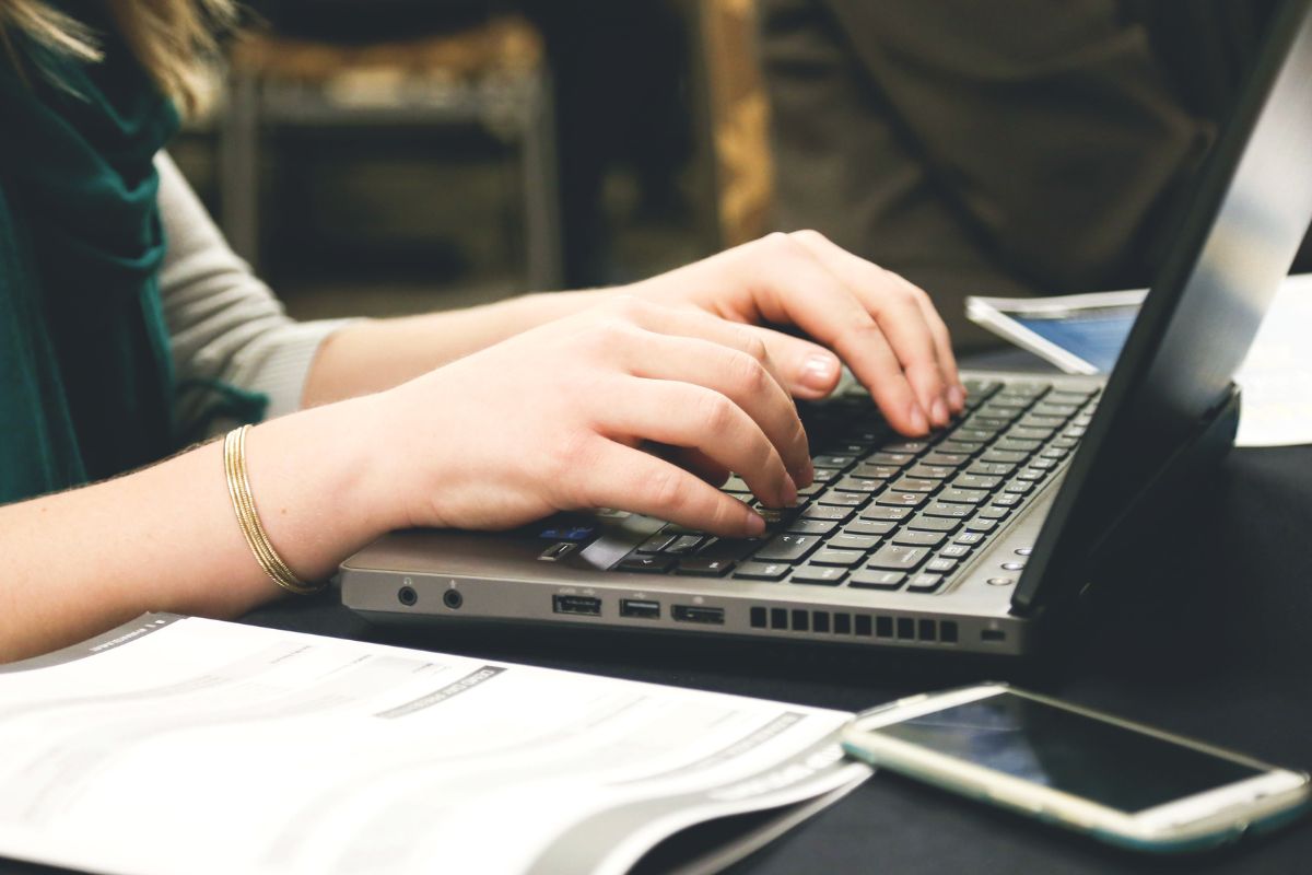 A picture of someone typing.