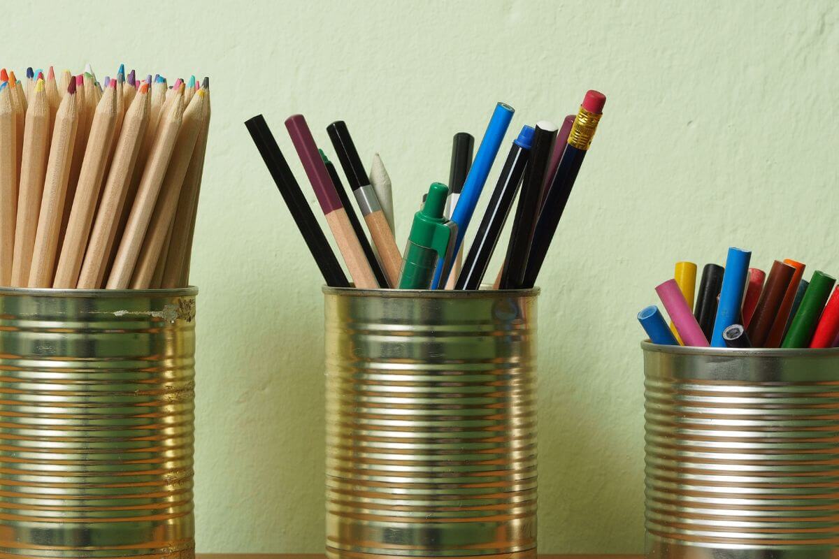 A picture of a can repurposed into an organizer.