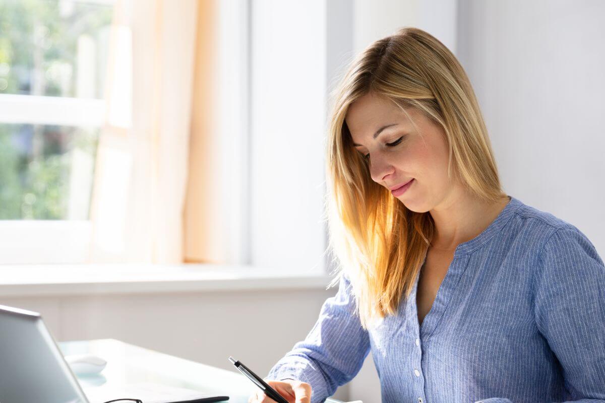 A picture of someone writing something. 