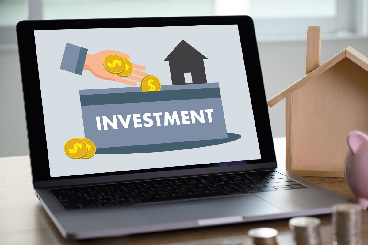 A picture of a laptop with an investment display.