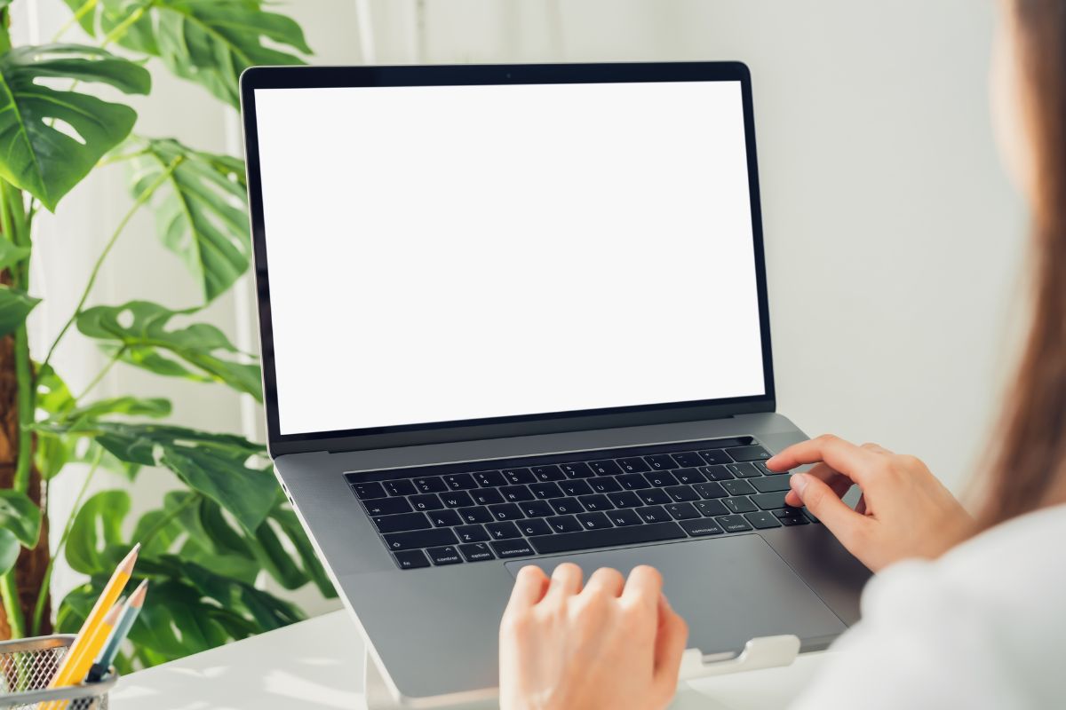An image of a woman using a laptop.
