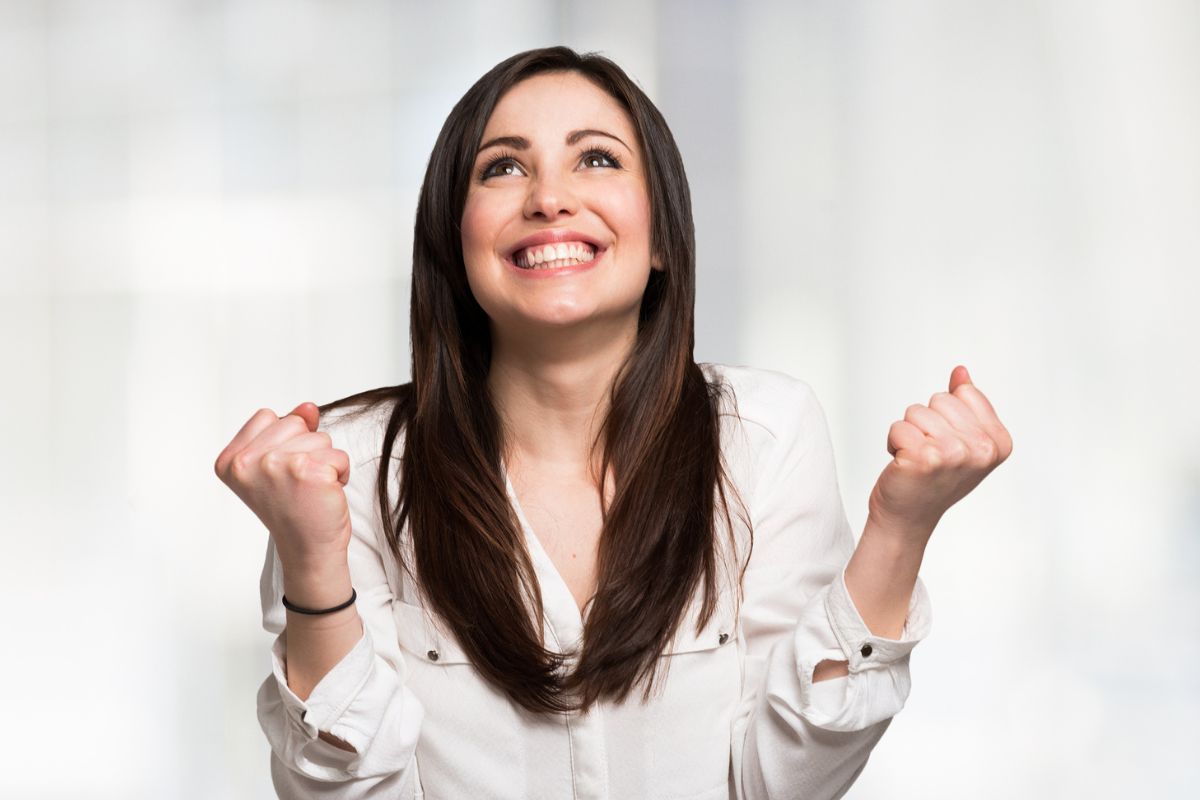 A picture shows a happy woman.