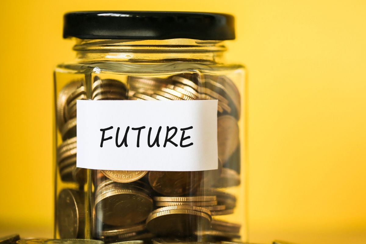 A picture shows a jar of savings for the future.