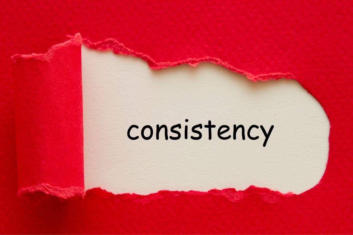 Une image montre un papier déchiré avec le mot cohérent.