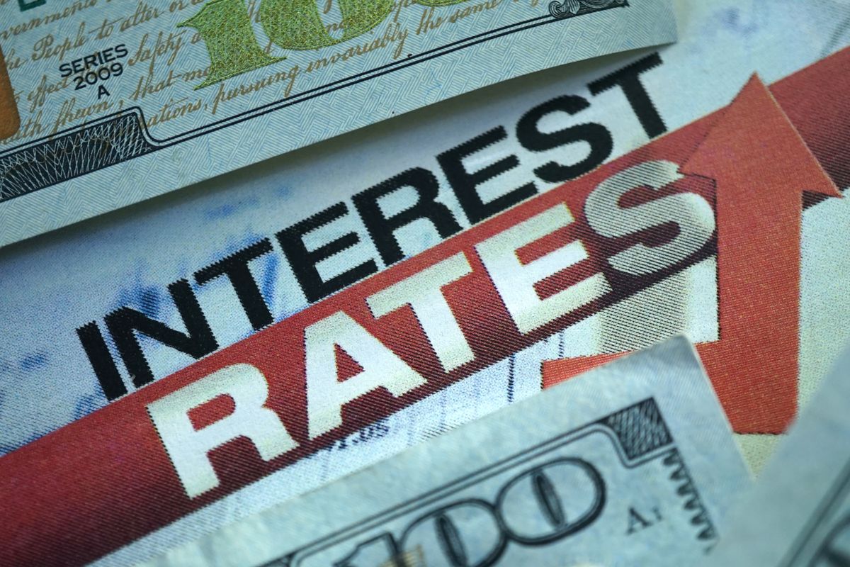 A picture of money and interest rates wording.