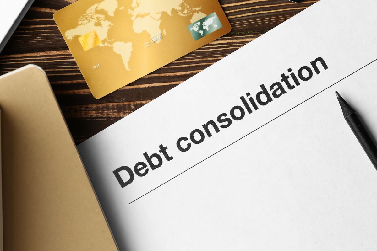 A picture of a card and paper with wording.