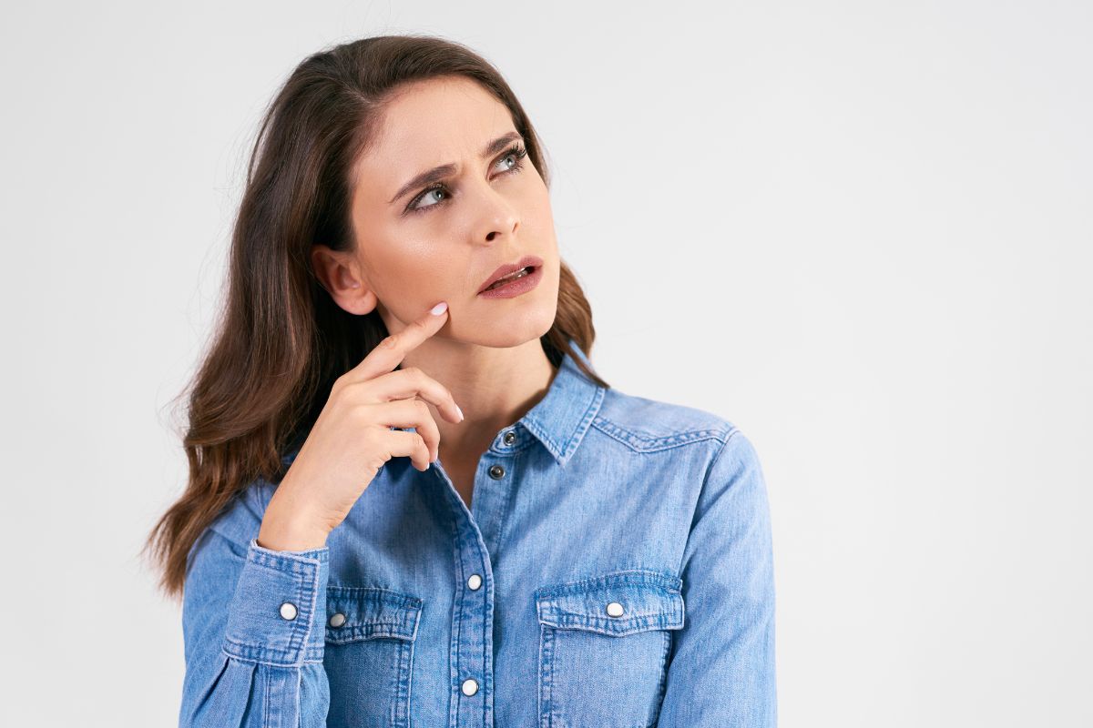 A picture shows a woman thinking about something.