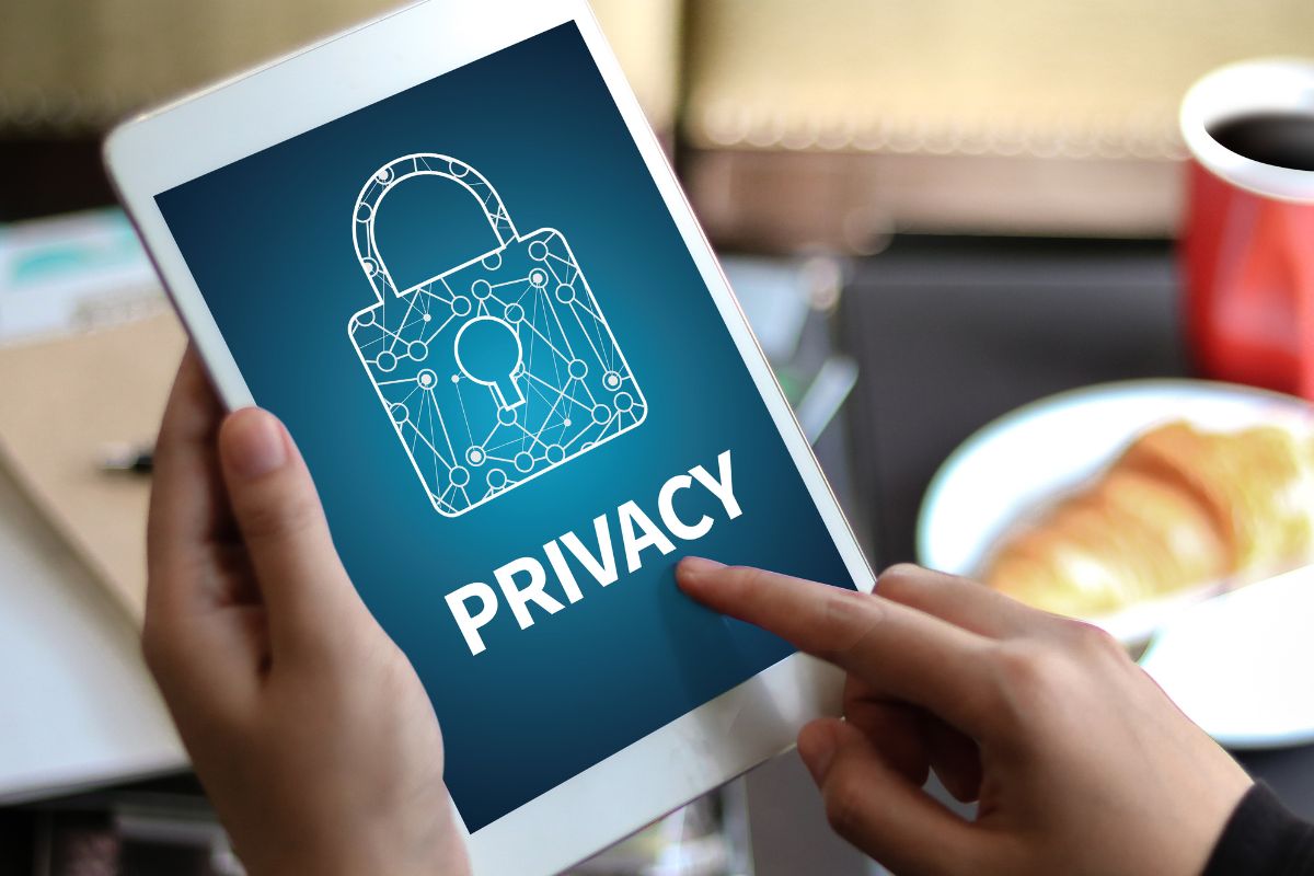 An image shows a woman using a tablet device.