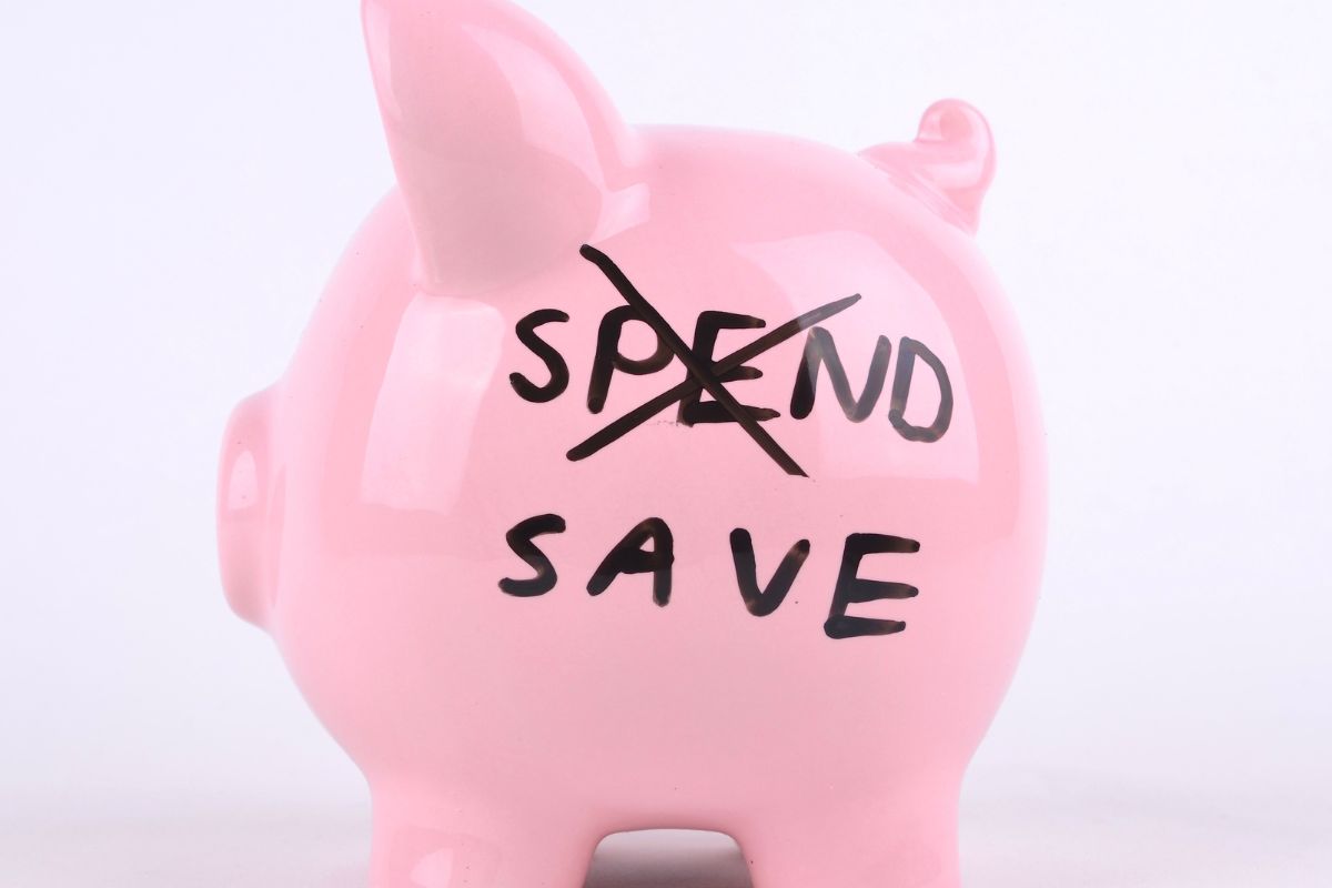 An image of a piggy bank with wording.