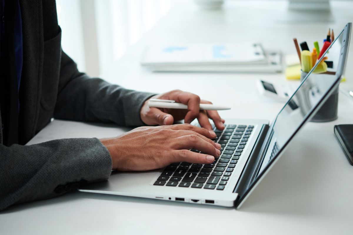 A picture of a man testing a website.