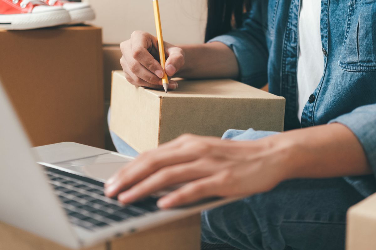 A picture shows a man selling products online.