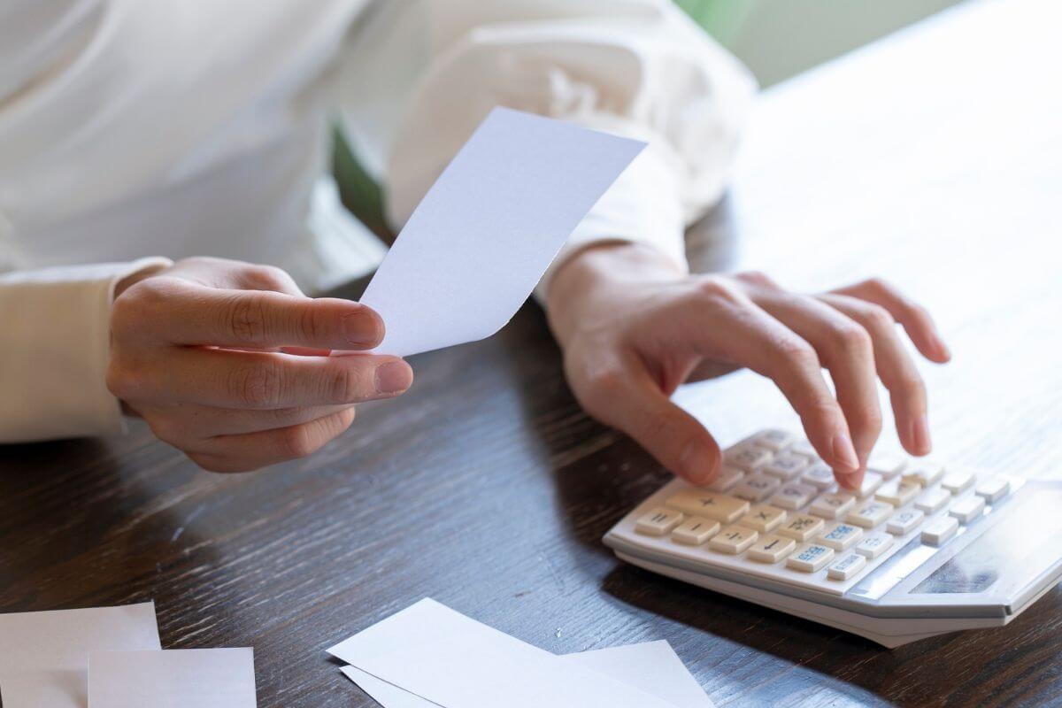 An image of a woman checking her spending.