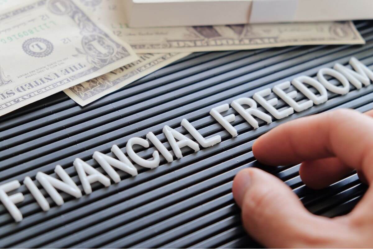 A picture shows money and financial freedom wording.