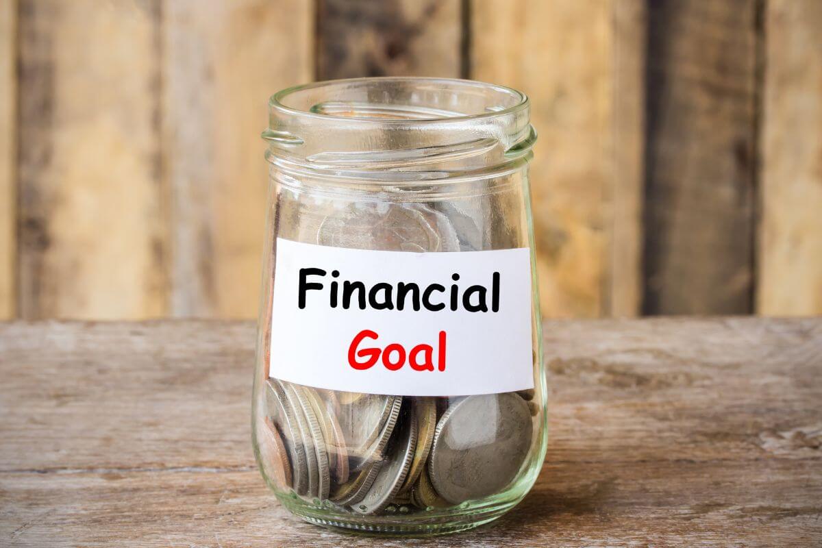 An image of a pot with a financial goal table.