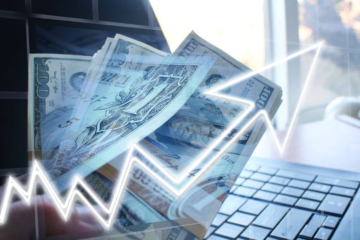 A picture of money and a rising arrow.