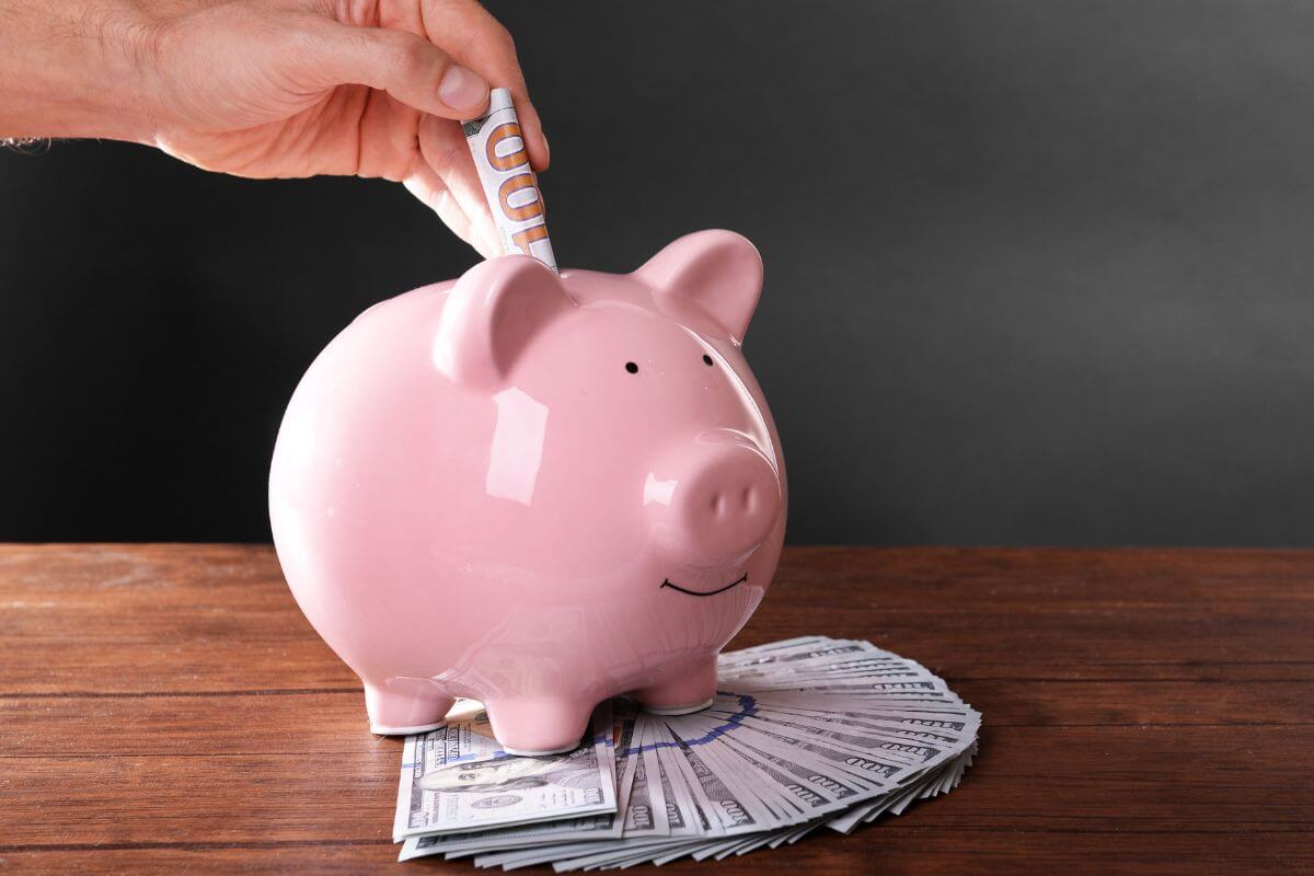 A picture of a man saving money.