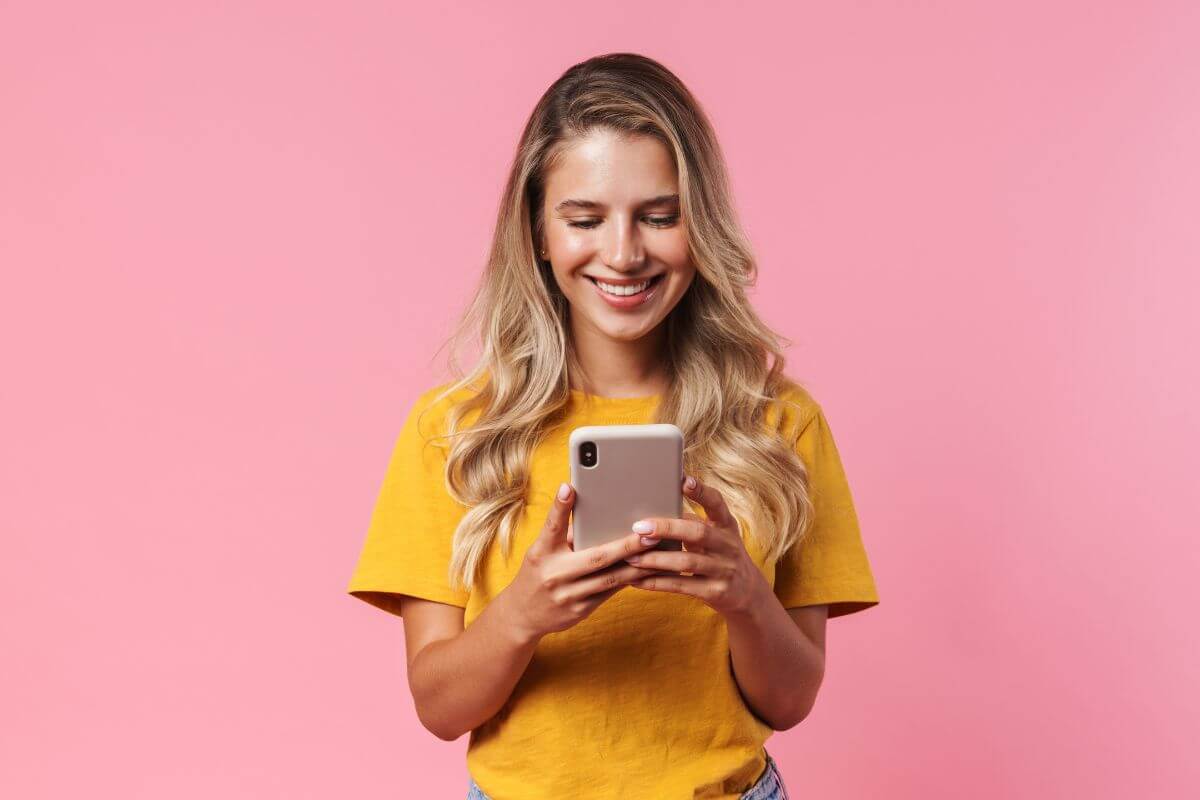 An image of a woman using a phone.