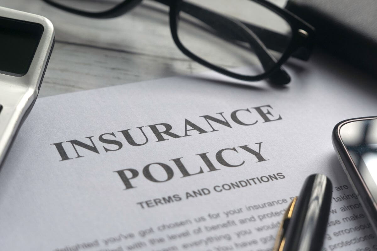 A picture of an insurance policy paper.