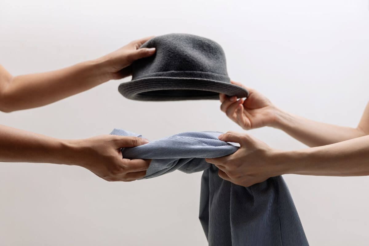 An image shows women swapping stuff.