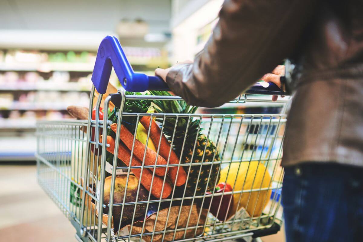A picture of a woman shopping for groceries.