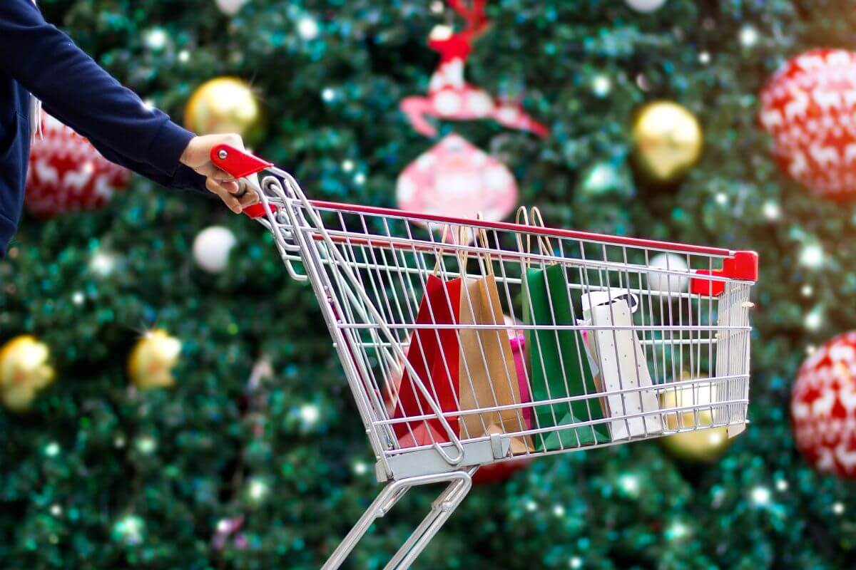 A picture shows a woman shopping for Christmas.
