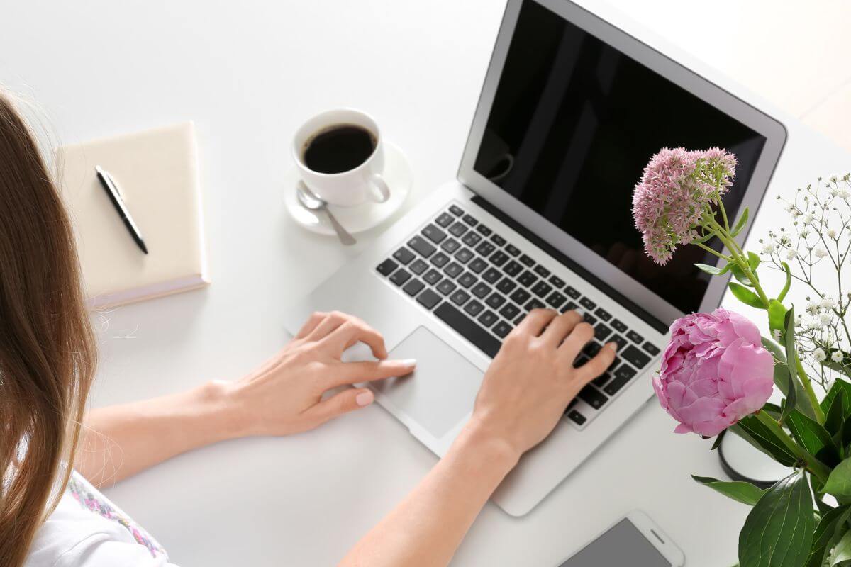 An image of a woman using a laptop.