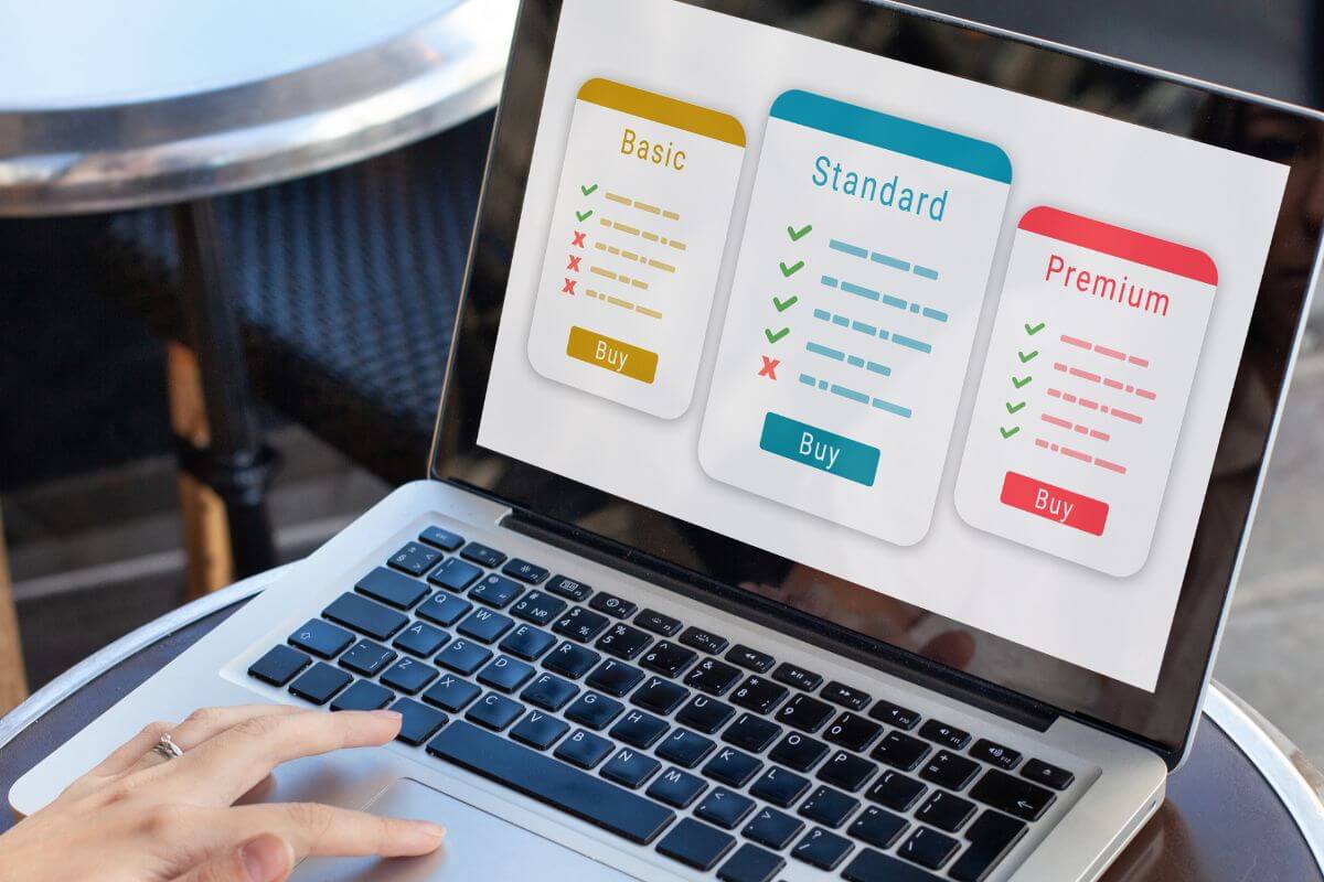 A picture of someone using a laptop.