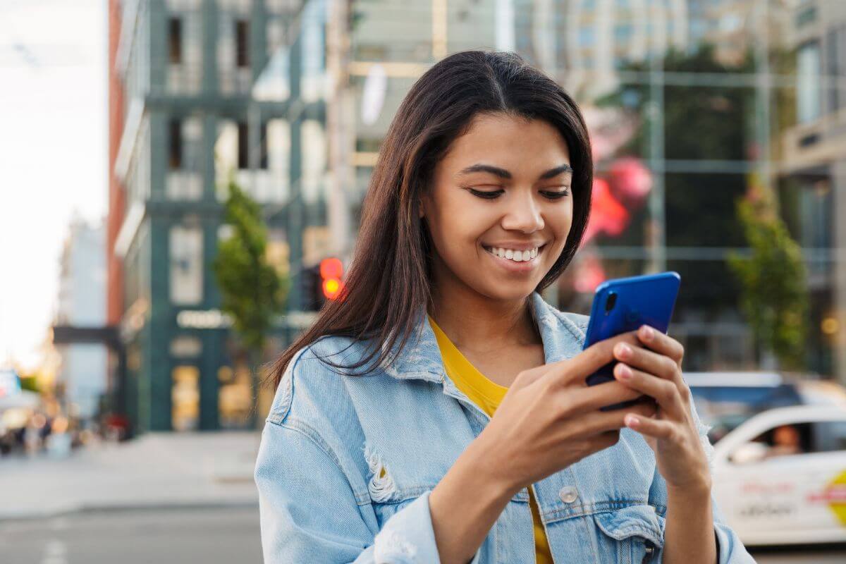 A picture of someone using their phone.