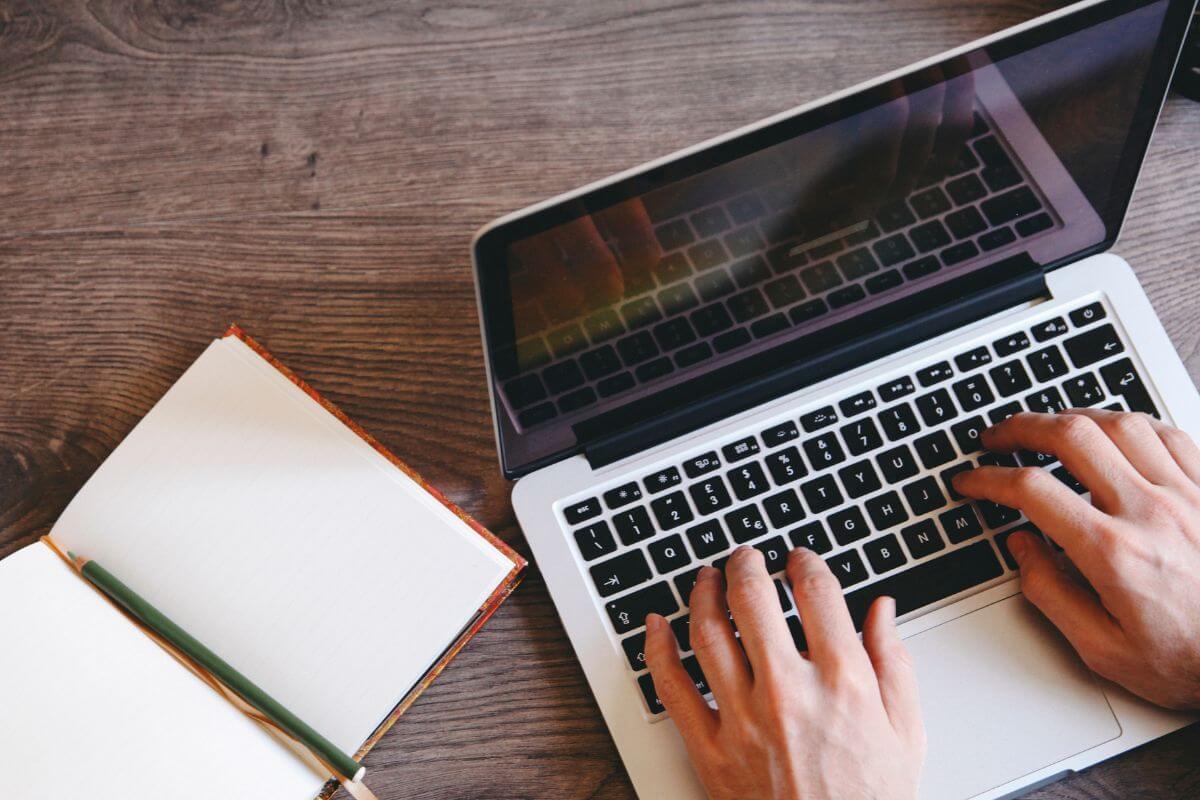 A picture of someone typing.