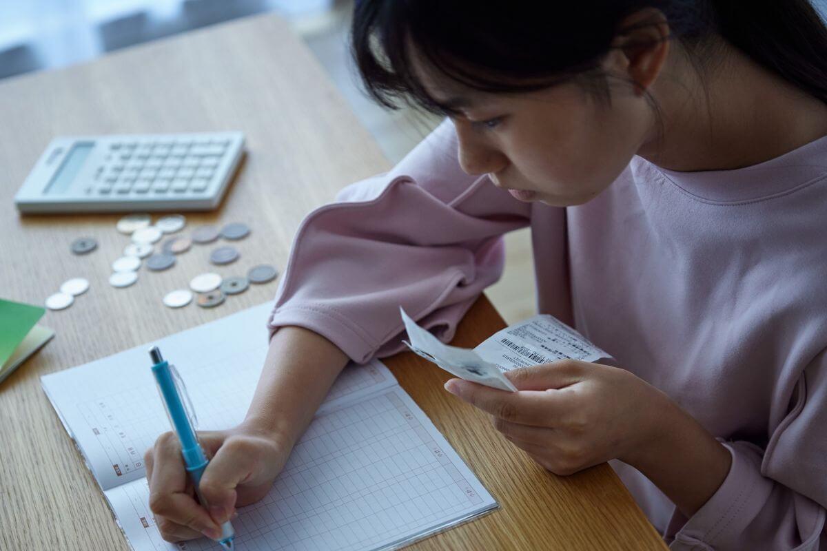 A picture of someone writing something.