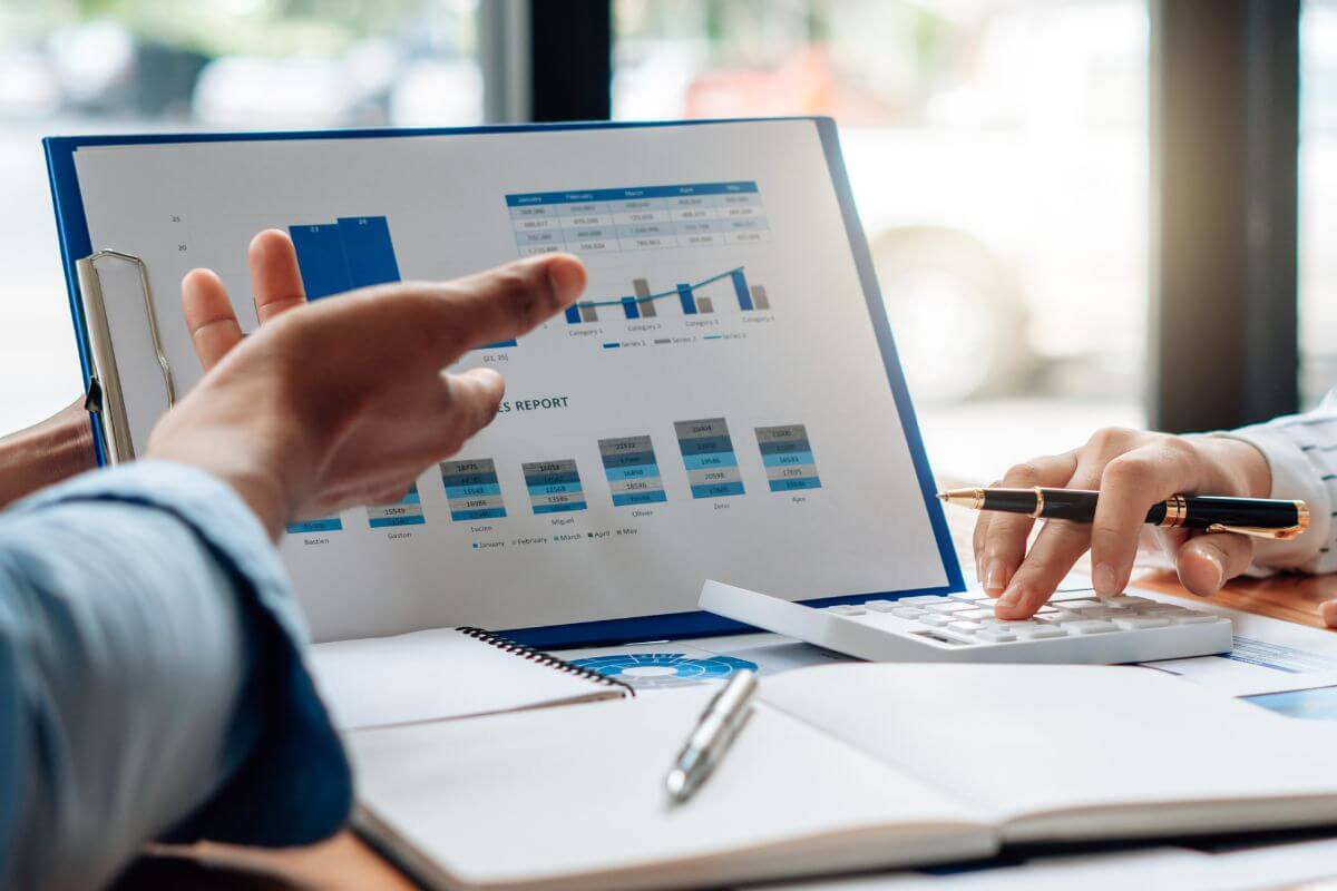 A picture of people reviewing finances.