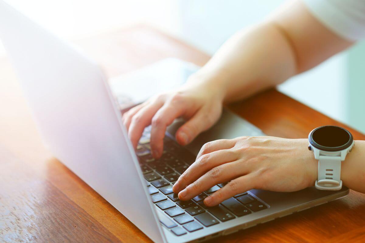 A picture of someone typing.