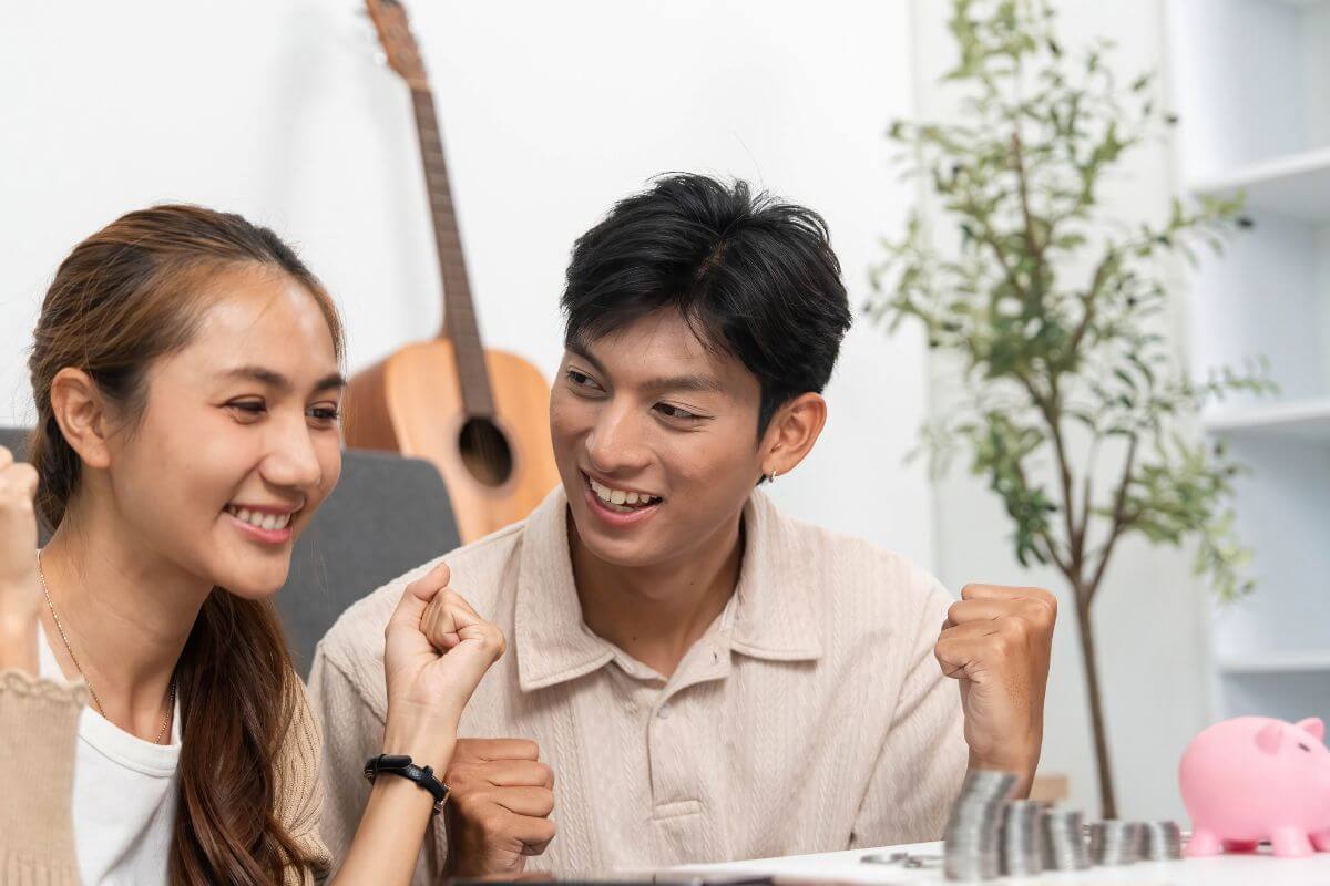 A picture of a couple with money goals. 