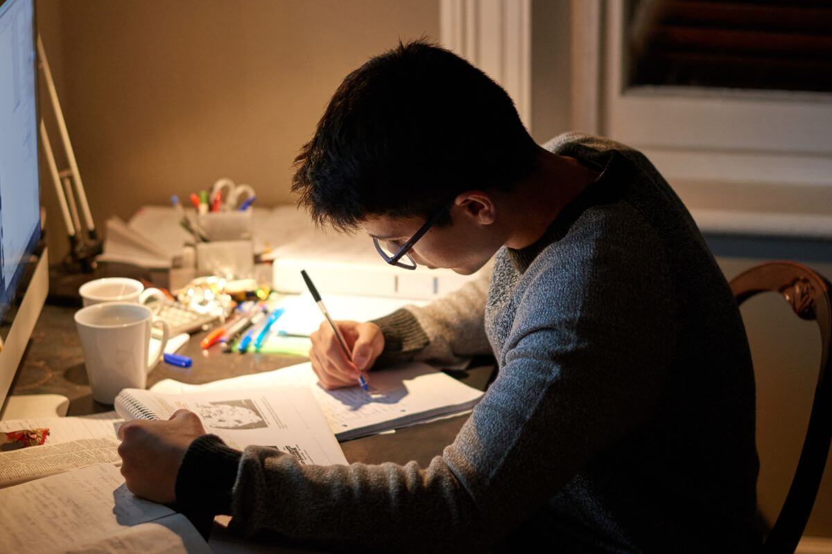 A picture of someone studying.