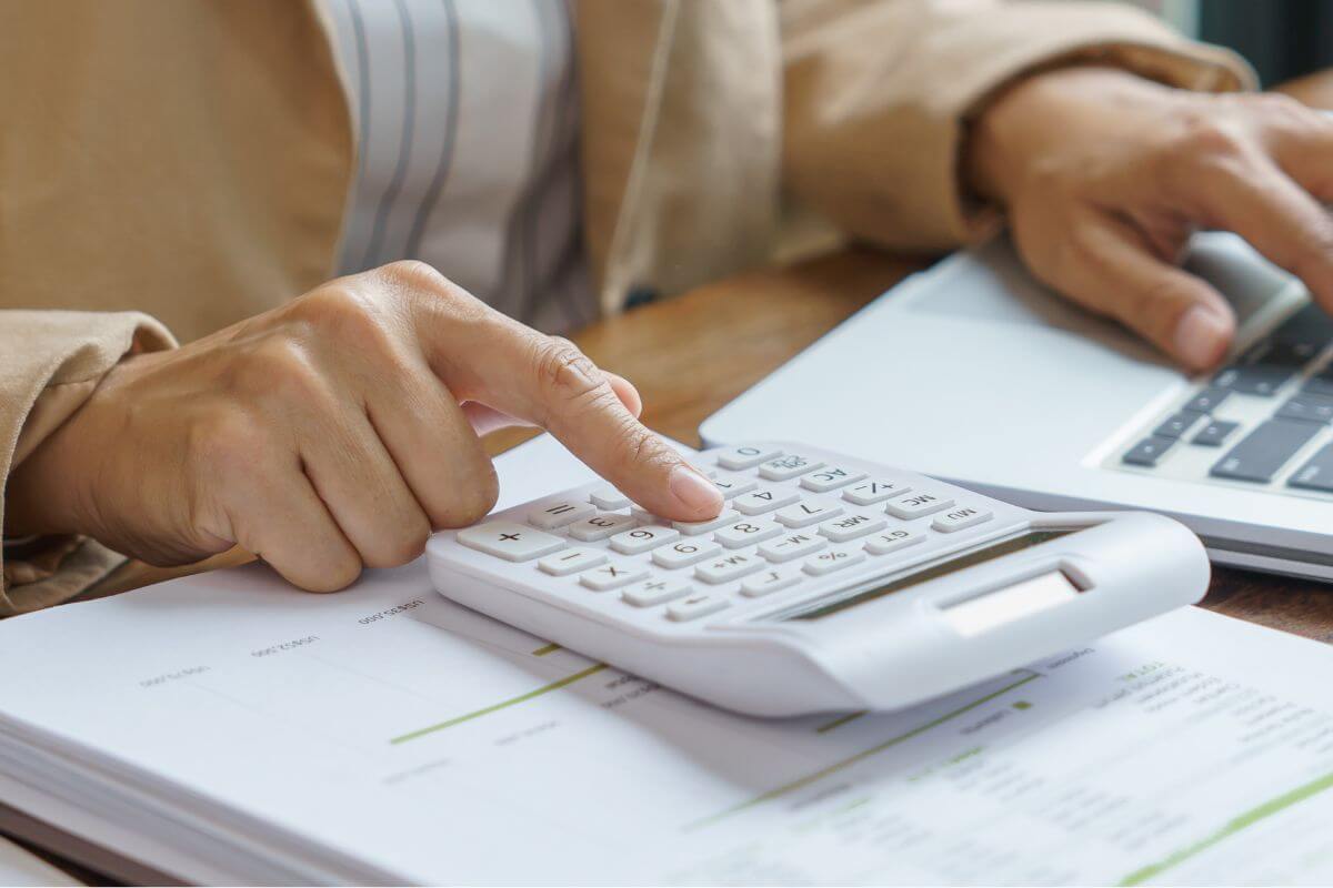 A picture of someone calculating. 