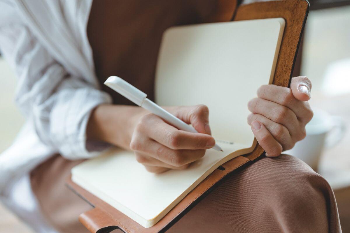 A picture of someone writing.