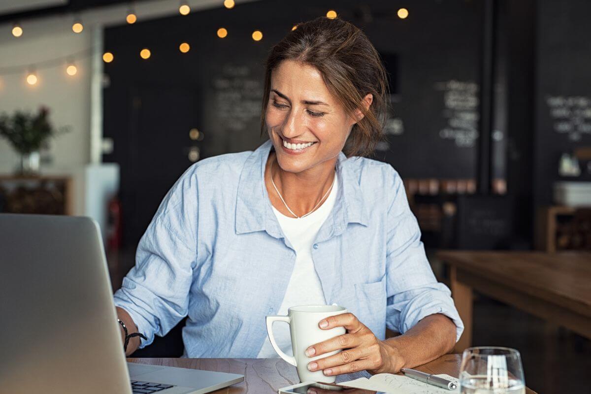 A picture of someone using their laptop.