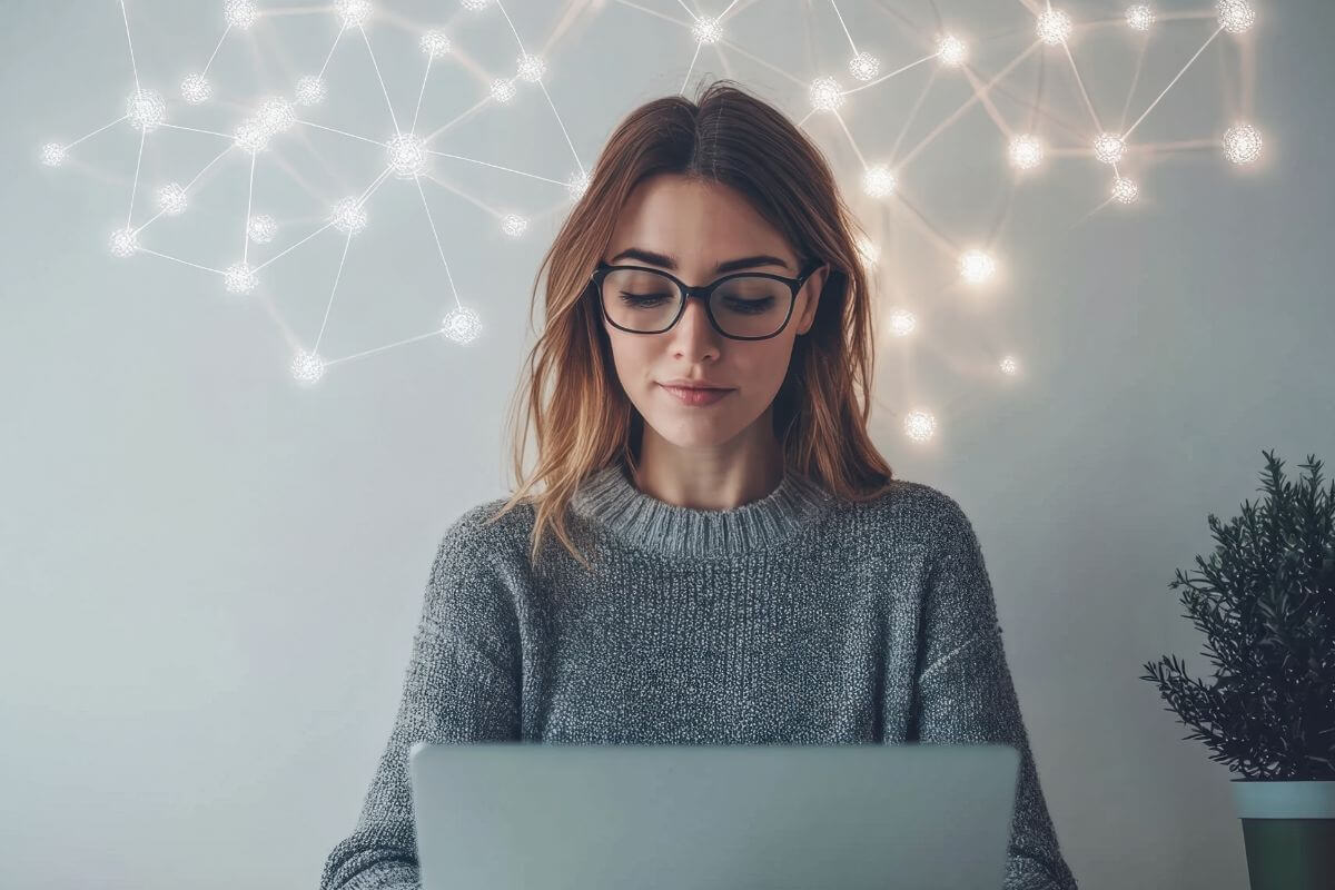 A picture of someone using their laptop.