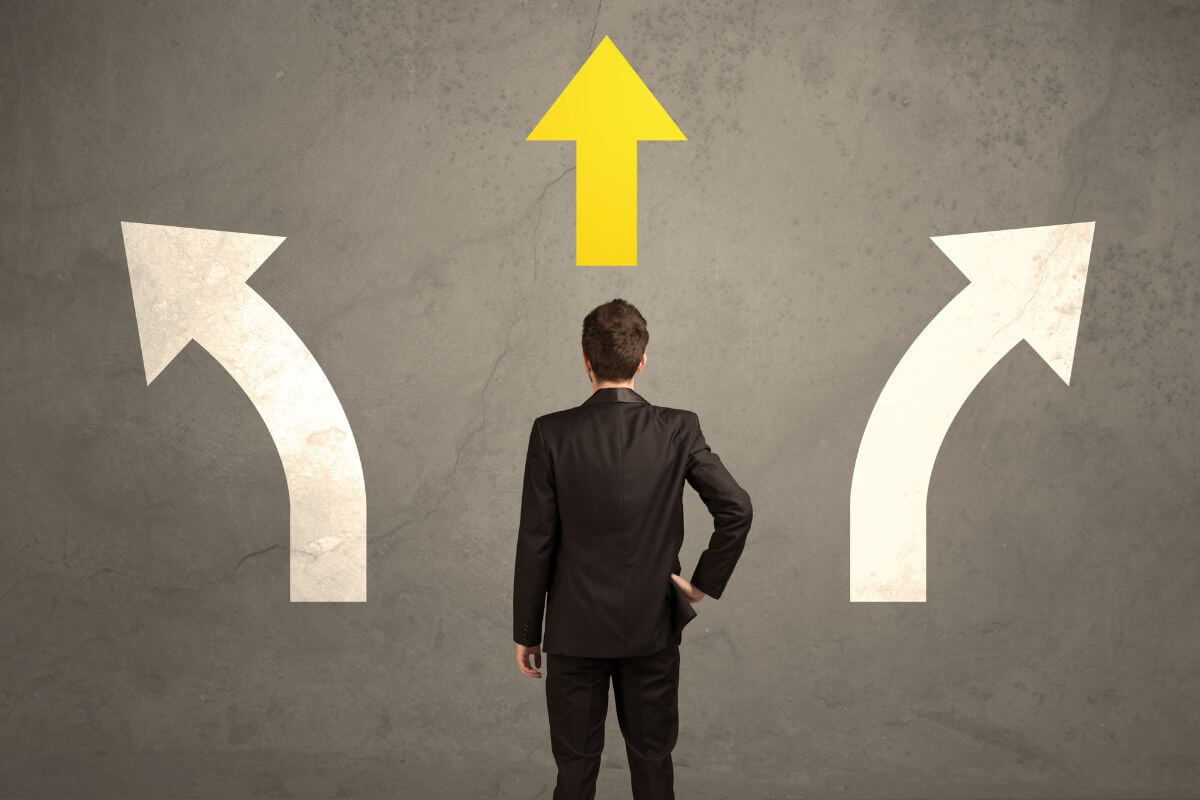 A picture of someone picking a direction.