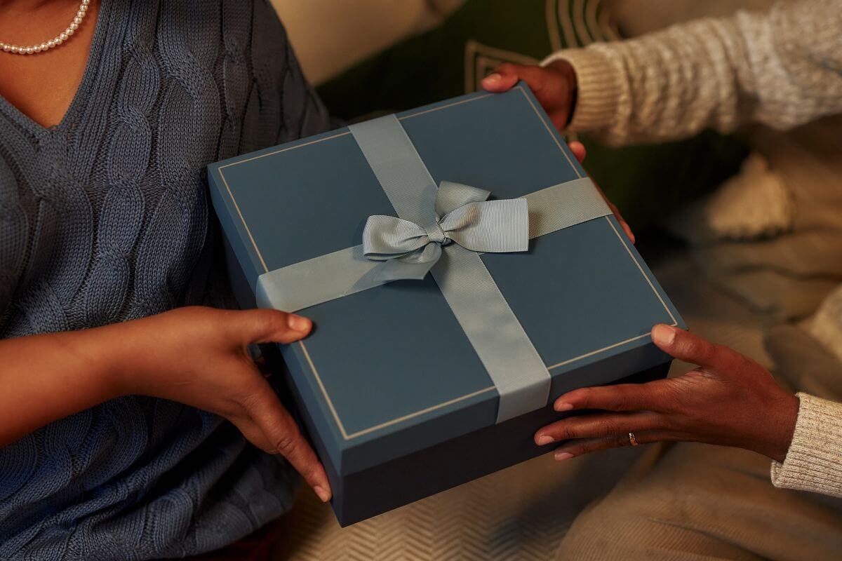 A picture of people exchanging gifts.
