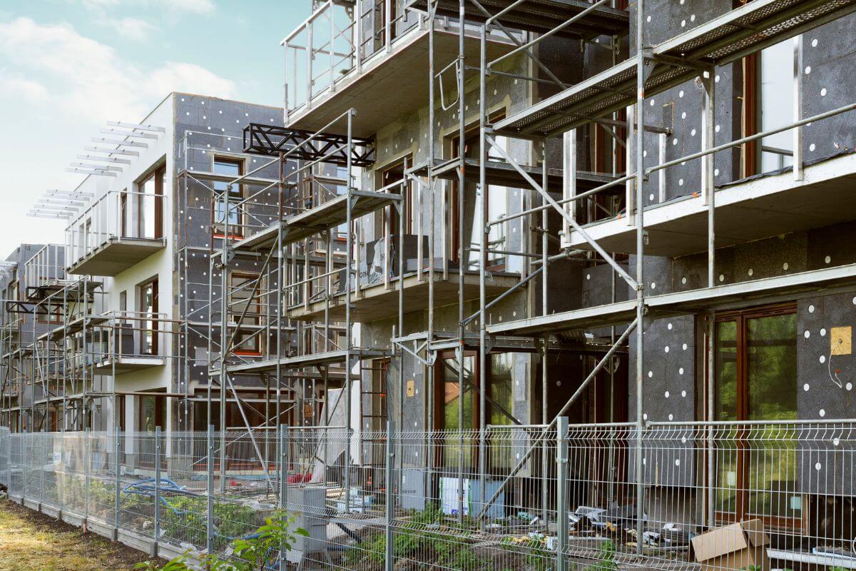 A picture of someone making homes.