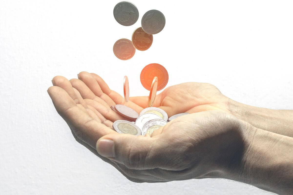 A picture of someone getting coins.