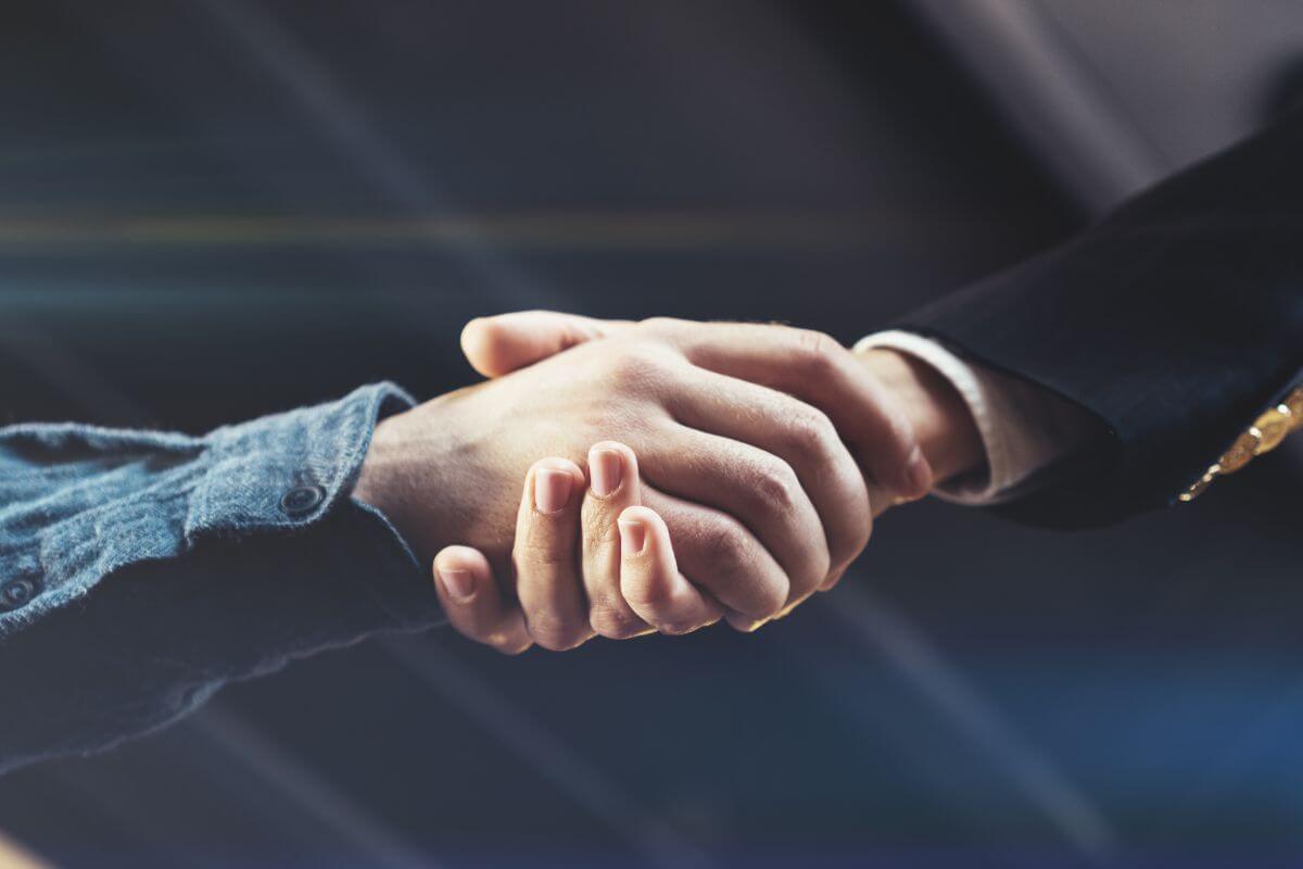 A picture of people shaking hands.