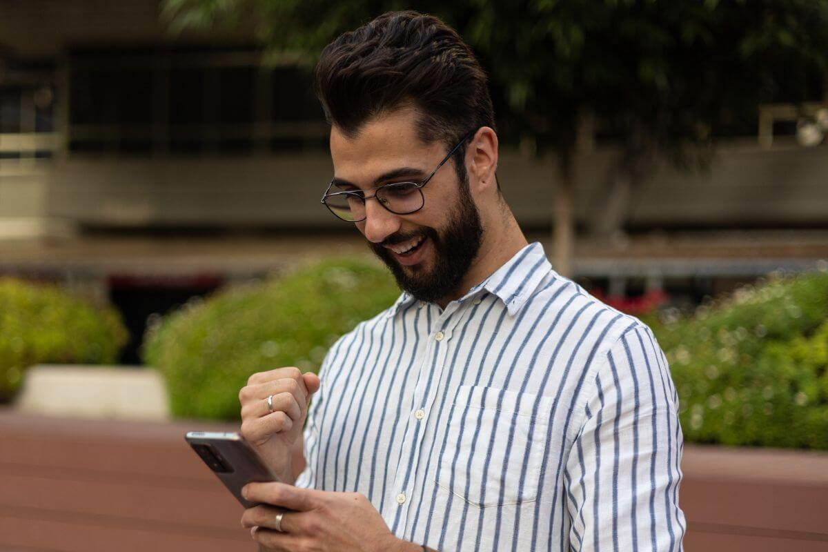 A picture of a man celebrating.