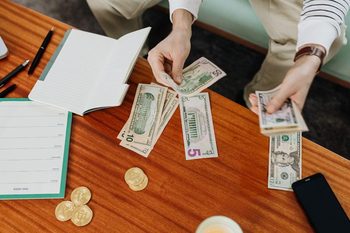 A picture of a retiree counting money.