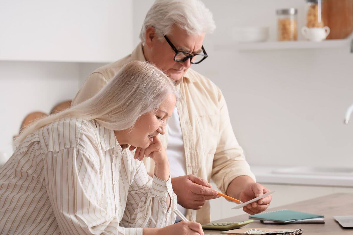 A picture of retirees planning something.