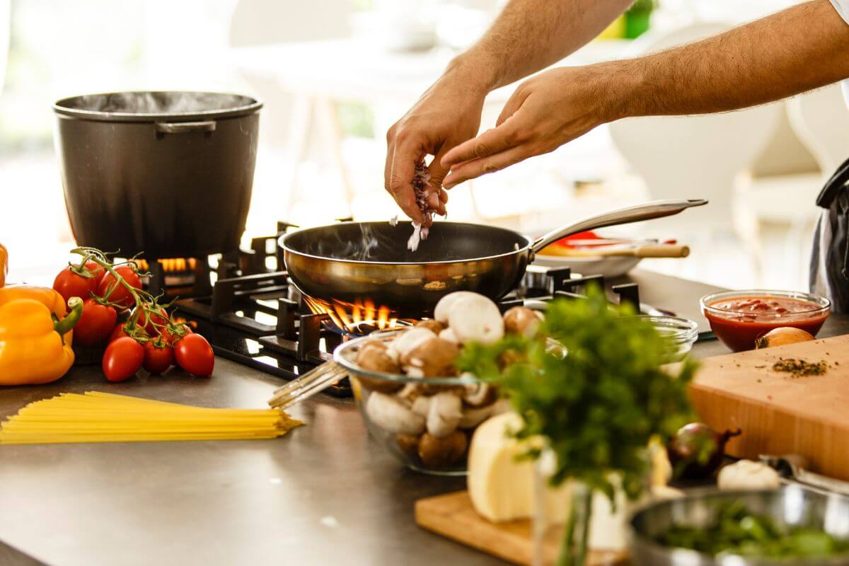 Picture a a person cooking.