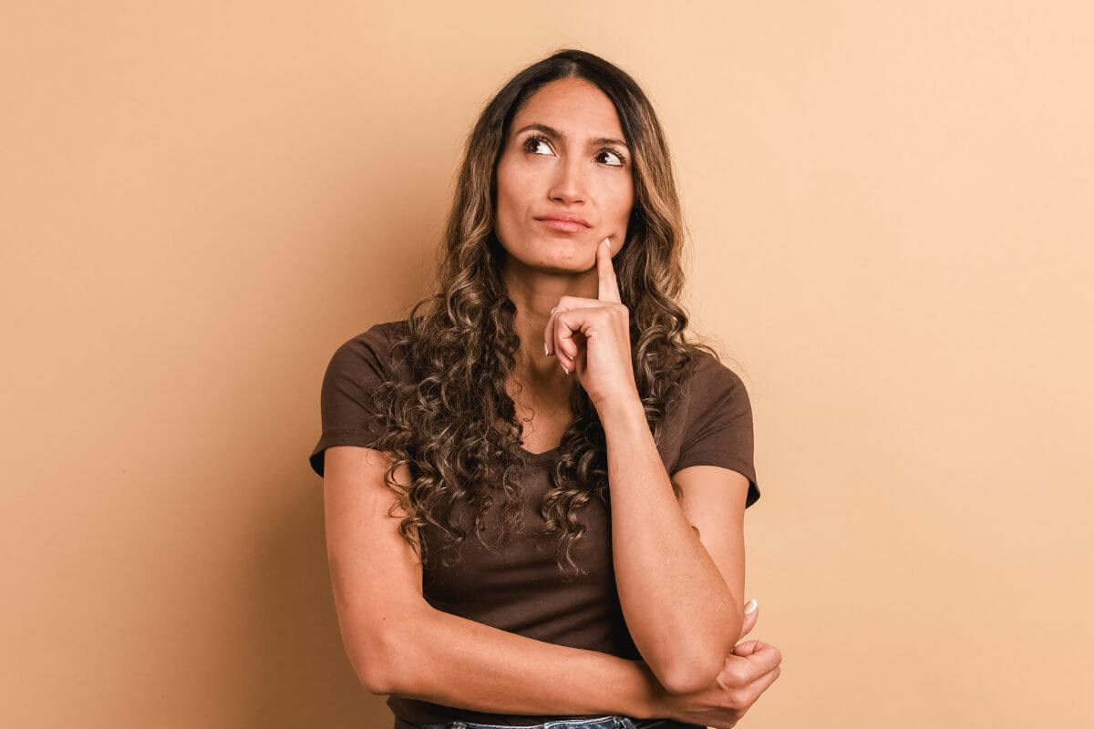 A picture of a woman thinking about something.
