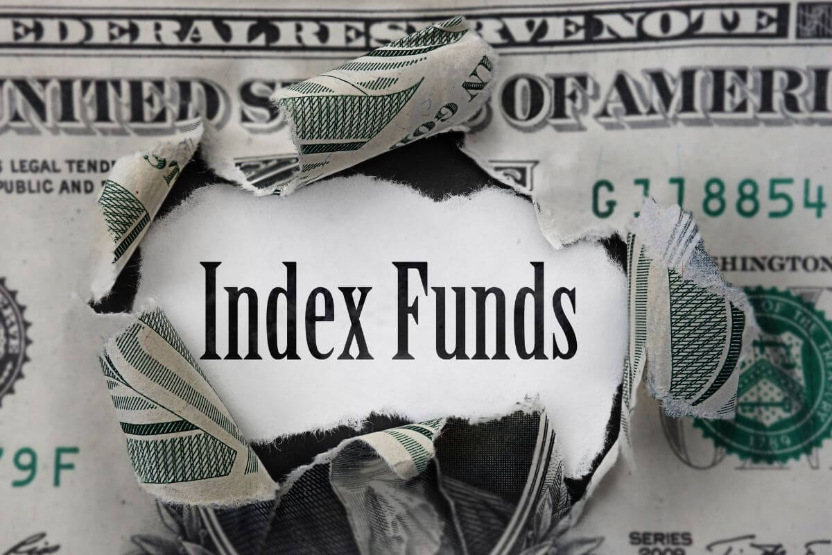 A picture of torn money with index fund wording.